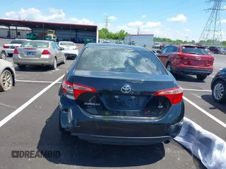 2019 Toyota Corolla L with VIN 5YFBURHE4KP860848, listed as a IAAI auction lot 42167529 with 152,301 mi miles. Bid and sale history available at carsss.com. Image 16.