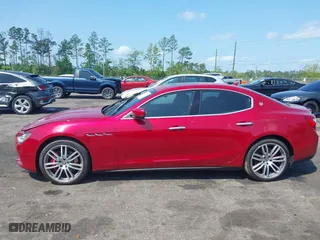 2015 Maserati Ghibli with VIN ZAM57XSA5F1129883, listed as a IAAI auction lot 41920750 with 63,739 mi miles. Bid and sale history available at carsss.com. Image 14.