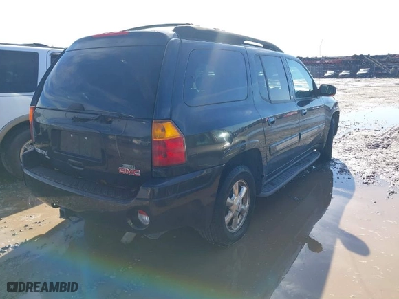 2003 GMC Envoy XL SLE with VIN 1GKES16S336222083, listed as a IAAI auction lot 41175612 with 323,364 mi miles. Bid and sale history available at carsss.com. Image 4.