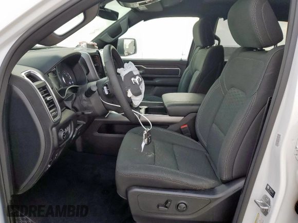 2025 Ram 1500 Lone Star with VIN 1C6SRFFP7SN652049, listed as a Copart auction lot 59545025 with 8,581 mi miles and Salvage title. Bid and sale history available at DreamBid. Image 7.