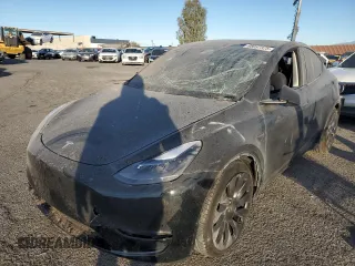 2023 Tesla Model Y Performance with VIN 7SAYGDEF5PF966796, listed as a Copart auction lot 88097325 with 6,927 mi miles and Salvage Title. Bid and sale history available at DreamBid. Image 1.