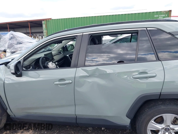 2019 Toyota RAV4 XLE with VIN JTMW1RFV7KD035614, listed as a IAAI auction lot 41970954 with 60,377 mi miles and . Bid and sale history available at DreamBid. Image 14.