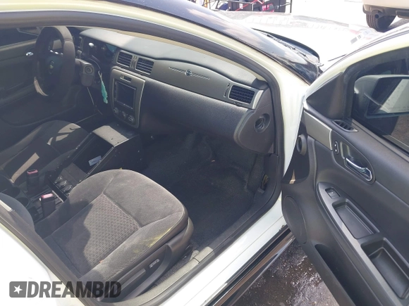 2012 Chevrolet Impala Police Police z VIN 2G1WD5E31C1161764, wystawiony jako IAAI lot #41918458 z przebiegiem 88 066 mil mil oraz . Historia ofert i sprzedaży dostępna na DreamBid. Obrazek 5.