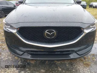 2018 Mazda CX-5 Touring with VIN JM3KFACM0J0315739, listed as a IAAI auction lot 40516262 with 60,727 mi miles. Bid and sale history available at carsss.com. Image 12.