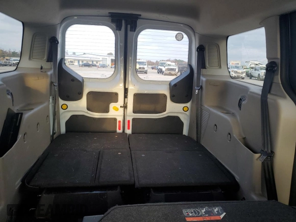 2015 Ford Transit Connect XLT с VIN NM0GS9F74F1178172, выставлен на аукционе Copart как лот 81821994 с пробегом 153 505 миль миль и Списание • Salvage title. История ставок и продаж доступна на DreamBid. Изображение 10.