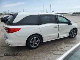 2020 Honda Odyssey Touring with VIN 5FNRL6H8XLB019365, listed as a Copart auction lot 52404335 with 59,486 mi miles and Salvage Title. Bid and sale history available at DreamBid. Image 3.