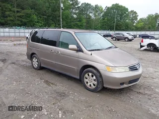 2004 Honda Odyssey EX-L z VIN 5FNRL189X4B036406, wystawiony jako IAAI lot #42368037 z przebiegiem 177 513 mil mil oraz . Historia ofert i sprzedaży dostępna na DreamBid. Obrazek 1.