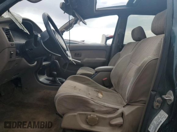 1997 Toyota 4Runner SR5 z VIN JT3HN86R9V0059388, wystawiony jako Copart lot #59231815 z przebiegiem 310 270 mil mil oraz Szkoda całkowita • Salvage title. Historia ofert i sprzedaży dostępna na DreamBid. Obrazek 7.