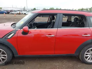 2015 MINI Countryman S with VIN WMWZC3C56FWP53249, listed as a IAAI auction lot 42256130 with 104,415 mi miles and . Bid and sale history available at DreamBid. Image 15.