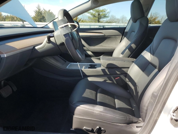 2023 Tesla Model 3 with VIN 5YJ3E1EA3PF610069, listed as a Copart auction lot 50327635 with 19,495 mi miles and Salvage Title. Bid and sale history available at carsss.com. Image 7.
