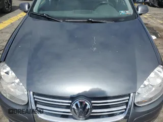 2009 Volkswagen Jetta SE with VIN 3VWRZ71K79M168084, listed as a Copart auction lot 57854825 with 150,986 mi miles and Salvage title. Bid and sale history available at DreamBid. Image 11.