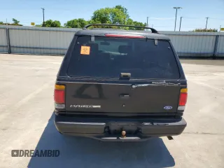 1997 Ford Explorer XLT with VIN 1FMDU35P5VZB51640, listed as a Copart auction lot 52030474 with 214,647 mi miles and Clean title. Bid and sale history available at DreamBid. Image 6.