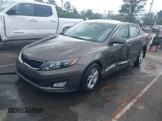 2015 Kia Optima LX with VIN 5XXGM4A72FG400848, listed as a IAAI auction lot 40802198 with 173,270 mi miles and . Bid and sale history available at DreamBid. Image 21.