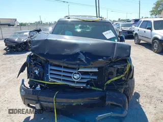 2005 Cadillac Escalade z VIN 1GYEK63N75R134012, wystawiony jako IAAI lot #41821485 z przebiegiem 165 655 mil mil oraz . Historia ofert i sprzedaży dostępna na DreamBid. Obrazek 11.