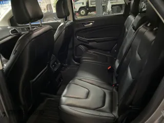 2020 Ford Edge Titanium z VIN 2FMPK4K91LBA91290, wystawiony jako IAAI lot #42494043 z przebiegiem 71 254 mil mil oraz . Historia ofert i sprzedaży dostępna na DreamBid. Obrazek 5.