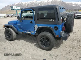 2002 Jeep Wrangler Sport with VIN 1J4FA49S32P762794, listed as a Copart auction lot 52132955 with 243,499 mi miles and Salvage Title. Bid and sale history available at carsss.com. Image 2.