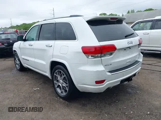 2020 Jeep Grand Cherokee Overland z VIN 1C4RJFCG9LC197401, wystawiony jako IAAI lot #42186412 z przebiegiem 64 870 mil mil oraz . Historia ofert i sprzedaży dostępna na DreamBid. Obrazek 3.