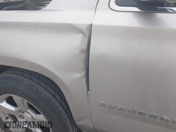 2015 Chevrolet Suburban LT with VIN 1GNSCJKC4FR744208, listed as a IAAI auction lot 41612915 with 87,445 mi miles and . Bid and sale history available at DreamBid. Image 6.
