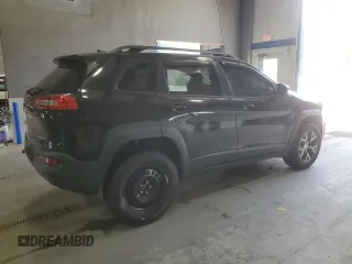 2014 Jeep Cherokee Trailhawk with VIN 1C4PJMBB8EW171116, listed as a Copart auction lot 60107215 with 168,979 mi miles and Salvage title. Bid and sale history available at DreamBid. Image 3.