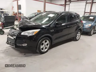 2015 Ford Escape SE with VIN 1FMCU9G97FUA21287, listed as a IAAI auction lot 41990144 with 55,036 mi miles and . Bid and sale history available at DreamBid. Image 2.