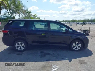 2017 Toyota Sienna L with VIN 5TDZZ3DC0HS860346, listed as a IAAI auction lot 42223979 with 215,659 mi miles and . Bid and sale history available at DreamBid. Image 14.