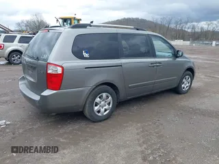 2010 Kia Sedona LX with VIN KNDMG4C30A6329449, listed as a IAAI auction lot 41946489 with 202,881 mi miles. Bid and sale history available at carsss.com. Image 4.