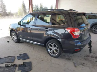 2016 Subaru Forester Touring with VIN JF2SJAXC0GH564305, listed as a IAAI auction lot 42111356 with 75,529 mi miles and . Bid and sale history available at DreamBid. Image 3.