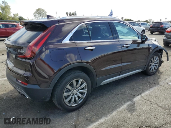 2020 Cadillac XT4 FWD Premium Luxury with VIN 1GYFZCR46LF112188, listed as a Copart auction lot 51536115 with 31,427 mi miles and Salvage title. Bid and sale history available at DreamBid. Image 3.