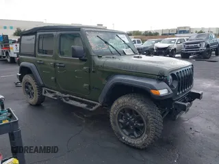 2023 Jeep Wrangler Unlimited Willys Sport with VIN 1C4HJXDM0PW515898, listed as a IAAI auction lot 41419267 with 10,964 mi miles and . Bid and sale history available at DreamBid. Image 14.