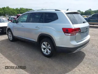 2018 Volkswagen Atlas SE z VIN 1V2DR2CAXJC521412, wystawiony jako IAAI lot #42309661 z przebiegiem 99 045 mil mil oraz . Historia ofert i sprzedaży dostępna na DreamBid. Obrazek 3.