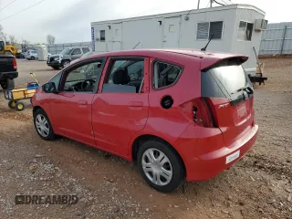 2009 Honda Fit with VIN JHMGE882X9S014265, listed as a Copart auction lot 51140695 with 130,809 mi miles and Salvage Title. Bid and sale history available at carsss.com. Image 2.