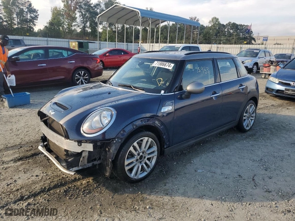 2017 MINI Hardtop 4 Door Cooper S with VIN WMWXU3C34H2D33408, listed as a Copart auction lot 71986674 with 75,953 mi miles and Salvage Title. Bid and sale history available at carsss.com. Image 1.