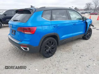 2023 Volkswagen Taos SE z VIN 3VVNX7B23PM344536, wystawiony jako IAAI lot #41069761 z przebiegiem 23 911 mil mil oraz . Historia ofert i sprzedaży dostępna na DreamBid. Obrazek 4.