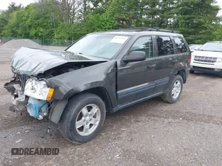 2005 Jeep Grand Cherokee Laredo z VIN 1J8GR48KX5C598646, wystawiony jako IAAI lot #42253900 z przebiegiem 197 848 mil mil oraz . Historia ofert i sprzedaży dostępna na DreamBid. Obrazek 2.