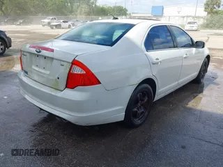 2011 Ford Fusion SE with VIN 3FAHP0HA0BR176938, listed as a IAAI auction lot 41888405 with 211,702 mi miles and . Bid and sale history available at DreamBid. Image 4.