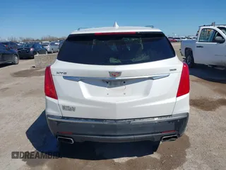 2017 Cadillac XT5 Premium Luxury FWD z VIN 1GYKNCRS9HZ106397, wystawiony jako IAAI lot #41659420 z przebiegiem 54 615 mil mil oraz . Historia ofert i sprzedaży dostępna na DreamBid. Obrazek 17.
