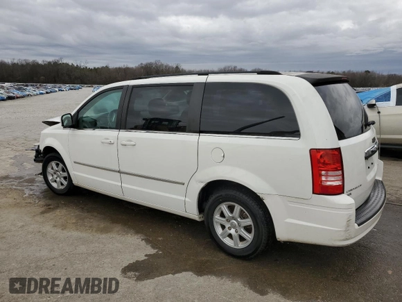 2010 Chrysler Town & Country Touring with VIN 2A4RR5DXXAR329758, listed as a Copart auction lot 48038975 with 86,975 mi miles and Salvage Title. Bid and sale history available at carsss.com. Image 2.