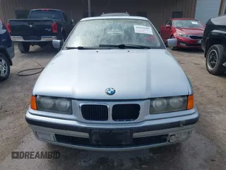 1998 BMW 3 Series 318i with VIN WBACC9322WEE60522, listed as a IAAI auction lot 41944303 with 226,799 mi miles. Bid and sale history available at carsss.com. Image 6.