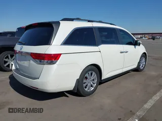 2016 Honda Odyssey EX-L with VIN 5FNRL5H67GB128929, listed as a IAAI auction lot 42126878 with 157,836 mi miles. Bid and sale history available at carsss.com. Image 4.