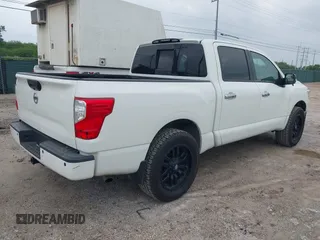 2018 Nissan Titan SV with VIN 1N6AA1E65JN506719, listed as a IAAI auction lot 42162605 with 81,255 mi miles. Bid and sale history available at carsss.com. Image 4.