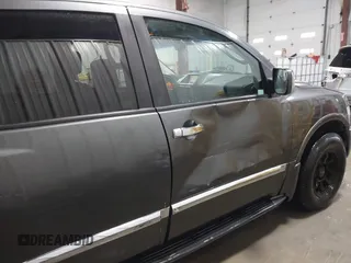 2004 Infiniti QX56 with VIN 5N3AA08C14N812225, listed as a IAAI auction lot 41496326 with 213,916 mi miles. Bid and sale history available at carsss.com. Image 6.