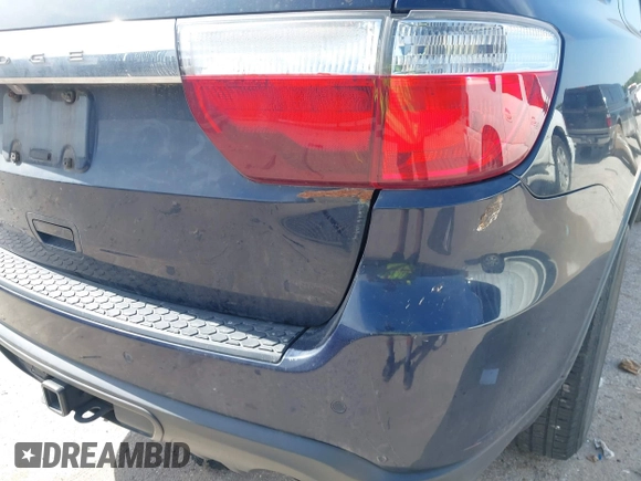 2012 Dodge Durango SXT with VIN 1C4RDHAG7CC197452, listed as a IAAI auction lot 42265707 with 217,252 mi miles and . Bid and sale history available at DreamBid. Image 6.