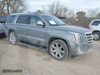2019 Cadillac Escalade Premium Luxury with VIN 1GYS4CKJ9KR182956, listed as a IAAI auction lot 41353808 with 109,896 mi miles. Bid and sale history available at carsss.com. Image 1.