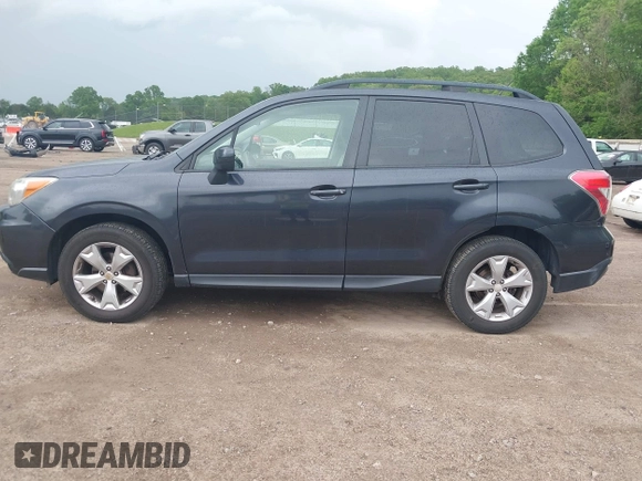 2014 Subaru Forester Premium with VIN JF2SJADC5EH402946, listed as a IAAI auction lot 42112508 with 254,173 mi miles and . Bid and sale history available at DreamBid. Image 14.