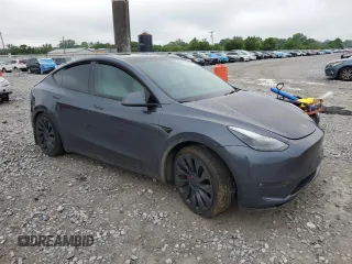 2022 Tesla Model Y Performance with VIN 7SAYGDEF7NF507184, listed as a Copart auction lot 58329875 with 98,320 mi miles and Salvage title. Bid and sale history available at DreamBid. Image 4.