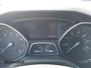 2014 Ford Focus SE with VIN 1FADP3F2XEL164830, listed as a IAAI auction lot 42073107 with 164,519 mi miles. Bid and sale history available at carsss.com. Image 7.