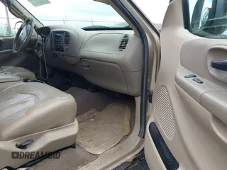 2000 Ford F-150 XL z VIN 2FTRX18L4YCA00725, wystawiony jako IAAI lot #42741630 z przebiegiem Nie podano mil oraz . Historia ofert i sprzedaży dostępna na DreamBid. Obrazek 5.