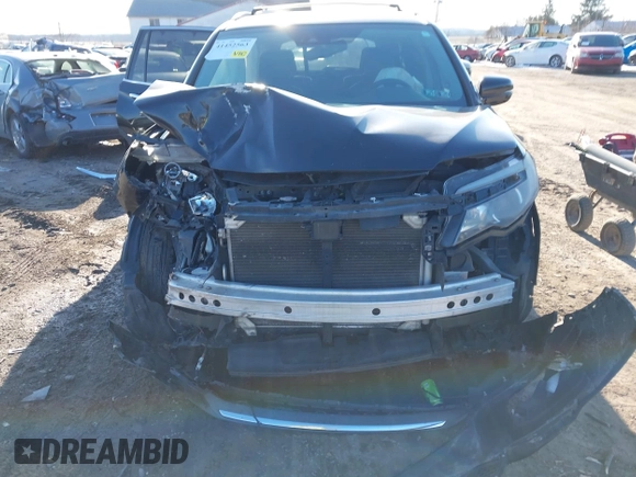 2016 Honda Pilot Elite with VIN 5FNYF6H01GB050524, listed as a IAAI auction lot 41452563 with 140,326 mi miles. Bid and sale history available at carsss.com. Image 12.