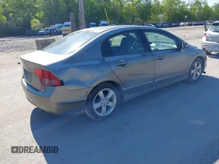 2006 Honda Civic LX z VIN 2HGFA16556H526744, wystawiony jako IAAI lot #42360805 z przebiegiem 236 970 mil mil oraz . Historia ofert i sprzedaży dostępna na DreamBid. Obrazek 4.