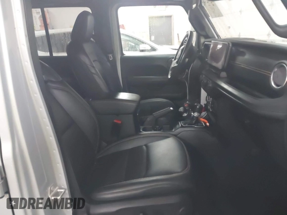 2024 Jeep Wrangler Sahara with VIN 1C4RJXP63RW202929, listed as a IAAI auction lot 41002346 with 12,332 mi miles and . Bid and sale history available at DreamBid. Image 5.